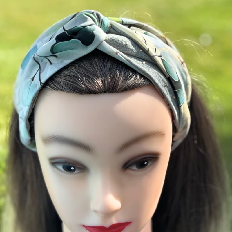 Bandeau cheveux torsadé dans les teintes vertes et blanches